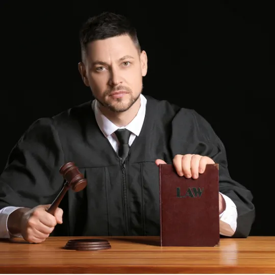 Judge holding gavel in a medical negligence legal case