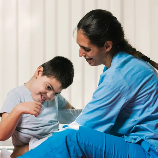 Healthcare professional assisting child affected by medical negligence