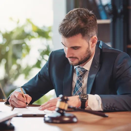 Lawyer reviewing documents for a medical negligence case