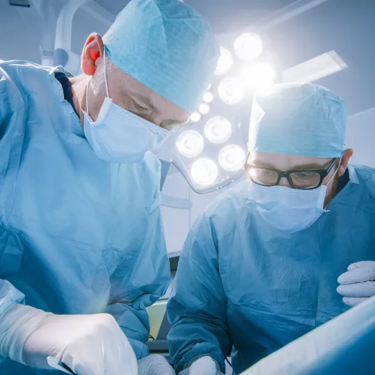 Surgeons performing a procedure relevant to a medical negligence claim