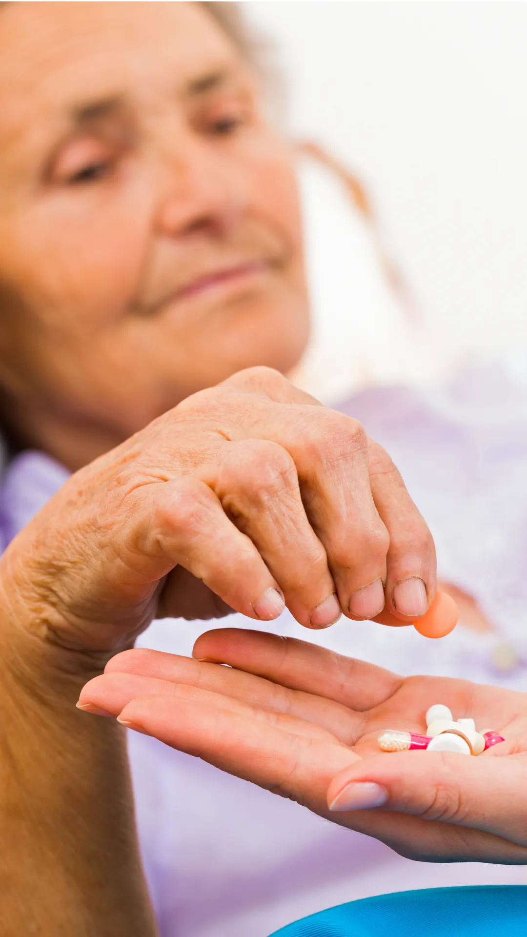 Elderly patient taking medication, illustrating medication error claims and the need for specialized recovery support.